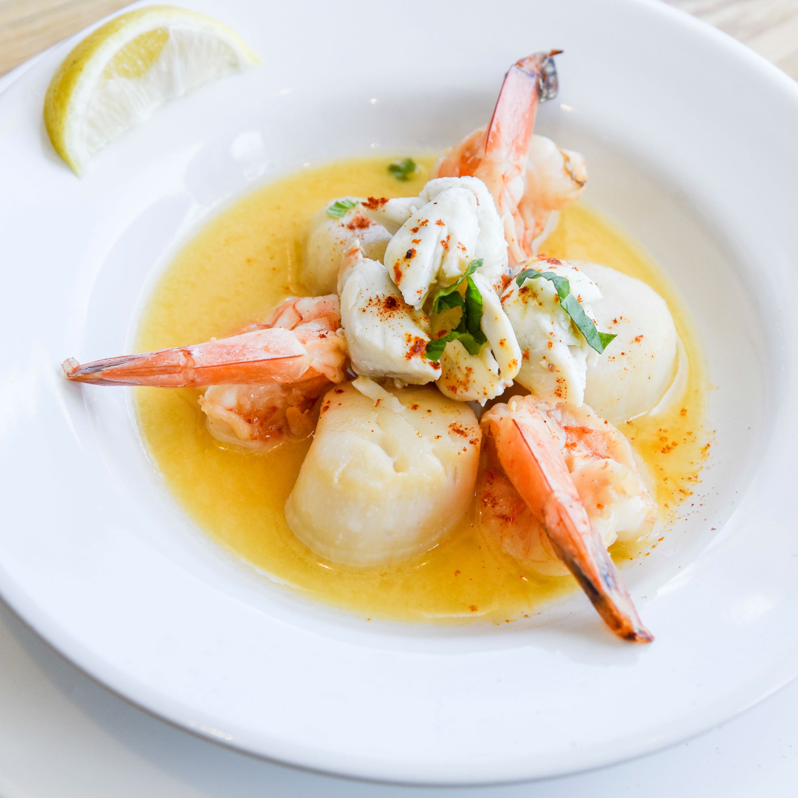 Scallops and shrimp topped with crab