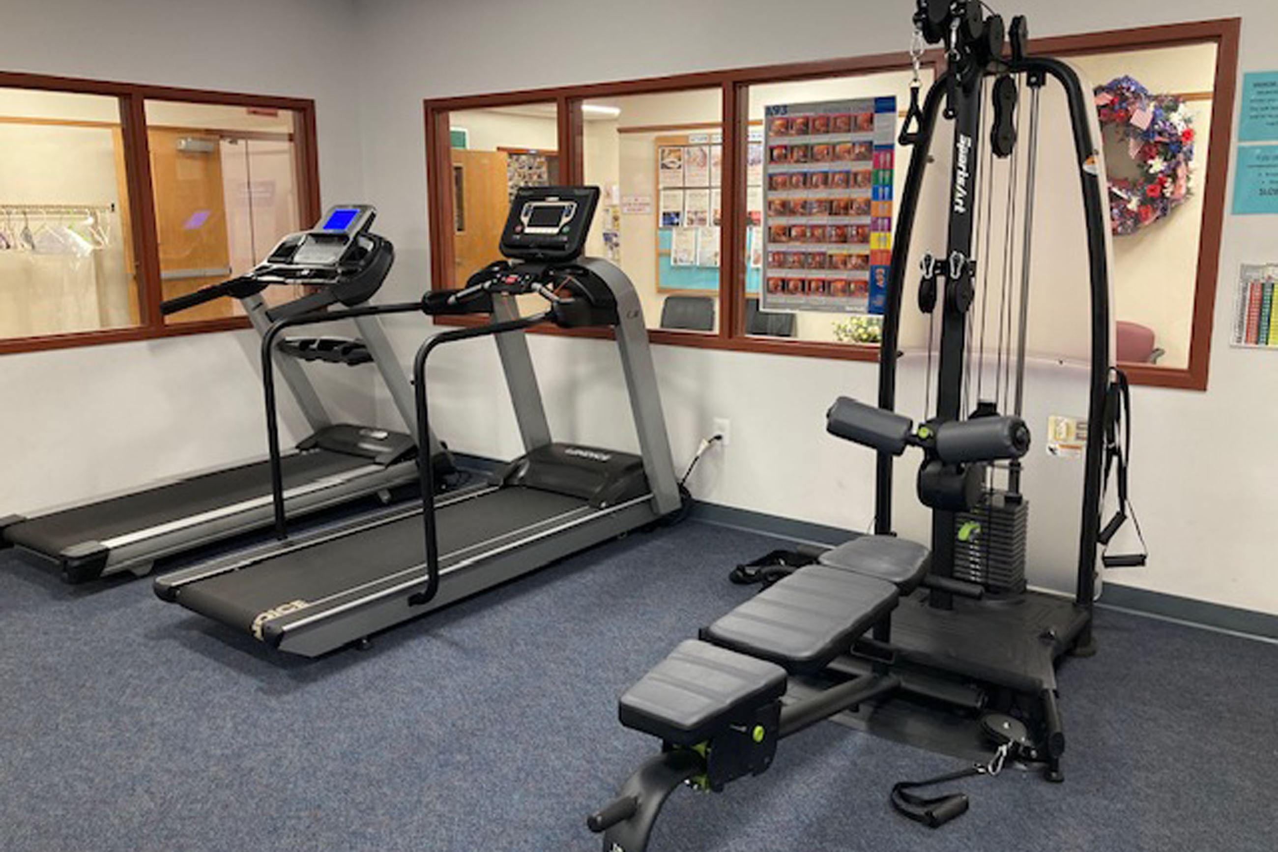 Weight lifting machine and treadmills